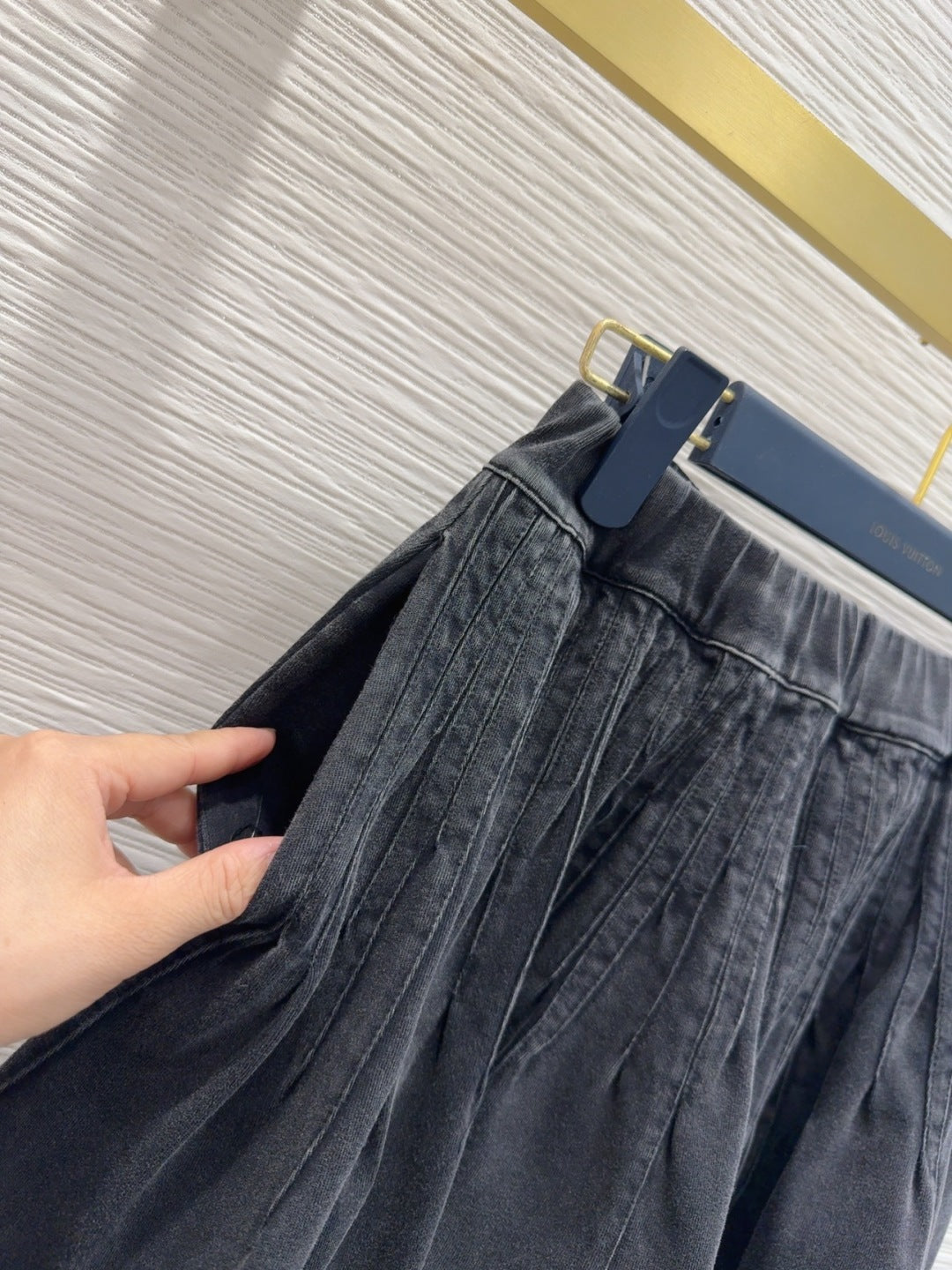 Mini Pleated Skirt with Logo Tag Detail