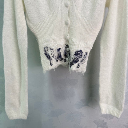 Delicate V-Neck Cardigan with Lace Hem