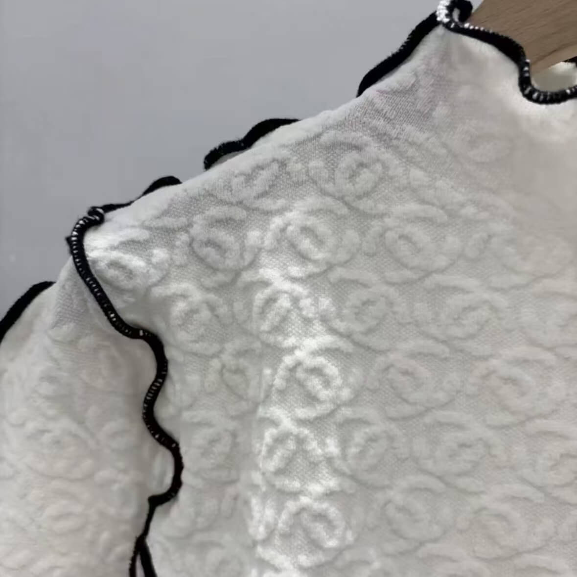 Lace-Trimmed All-Over Embossed Knit Top