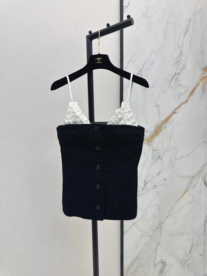 White floral top with black suspenders Vest