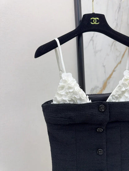 White floral top with black suspenders Vest
