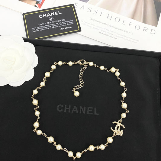 Classic Pearl Necklace with Metal Accents