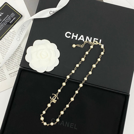 Classic Pearl Necklace with Metal Accents