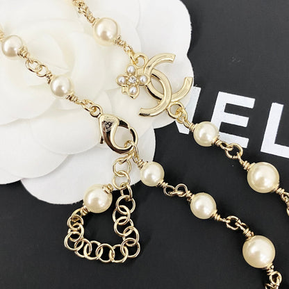 Classic Pearl Necklace with Metal Accents