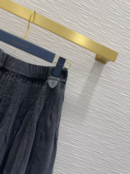 Mini Pleated Skirt with Logo Tag Detail