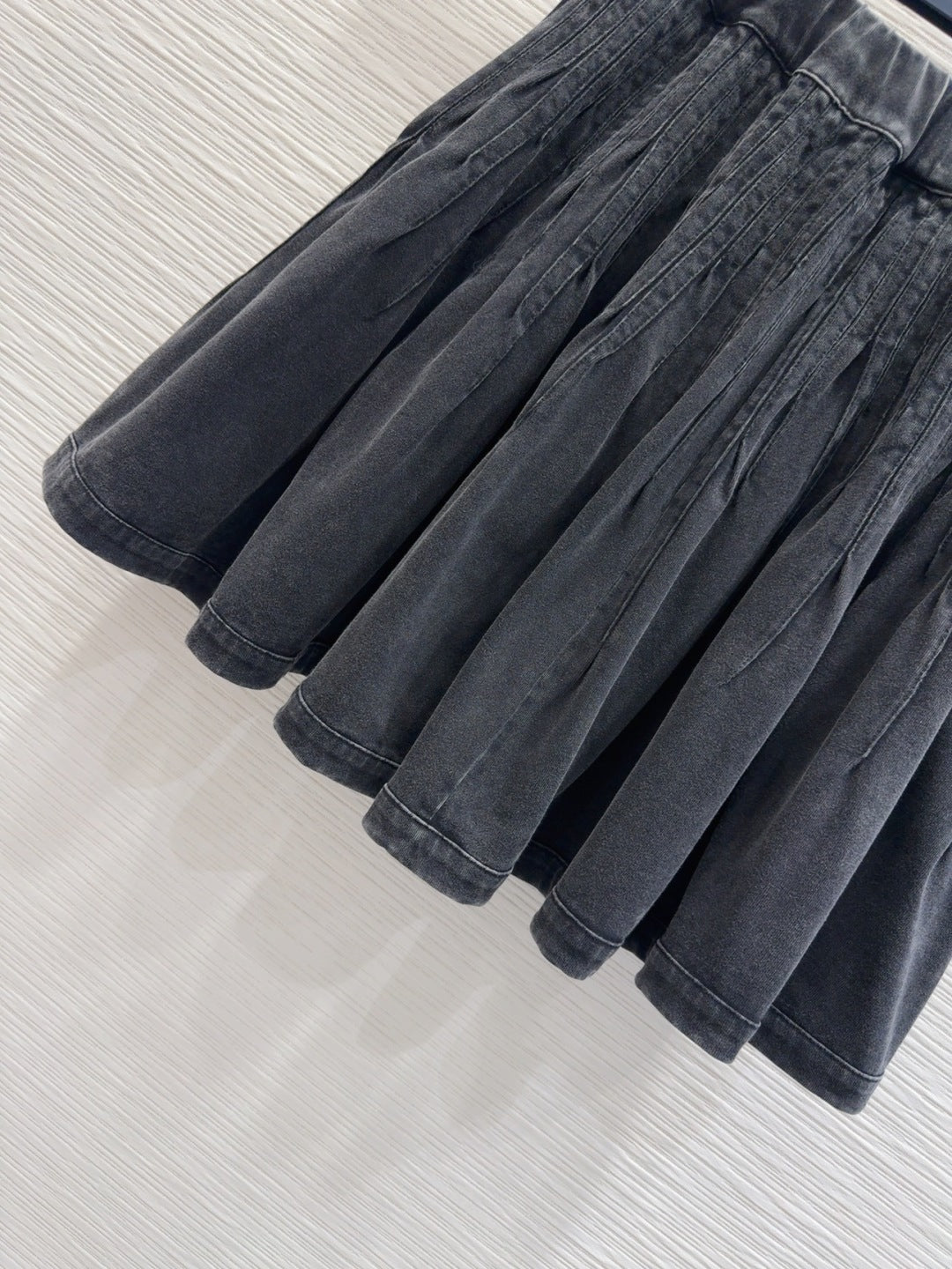 Mini Pleated Skirt with Logo Tag Detail